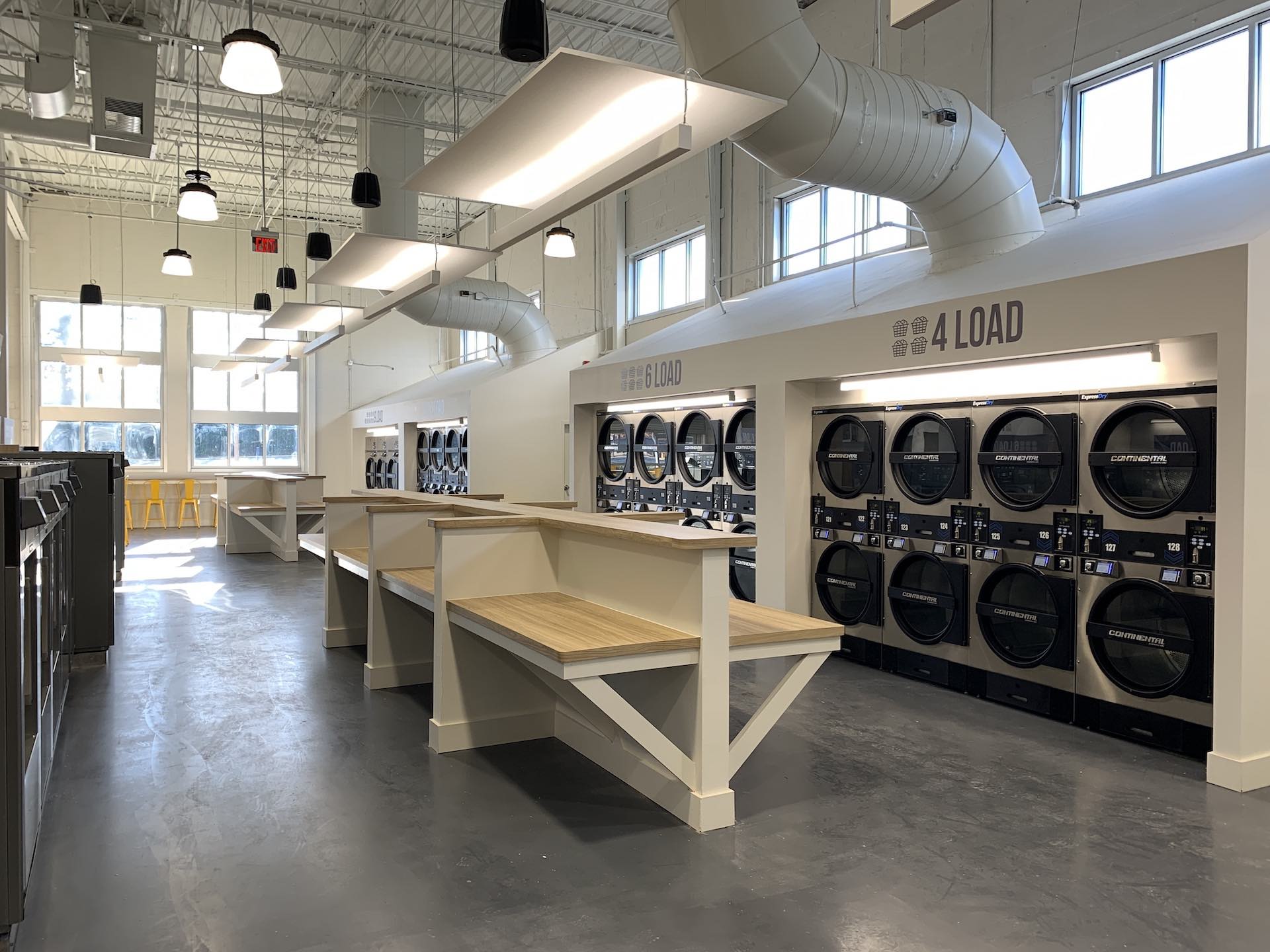 Folding tables and washers at Oz Laundry