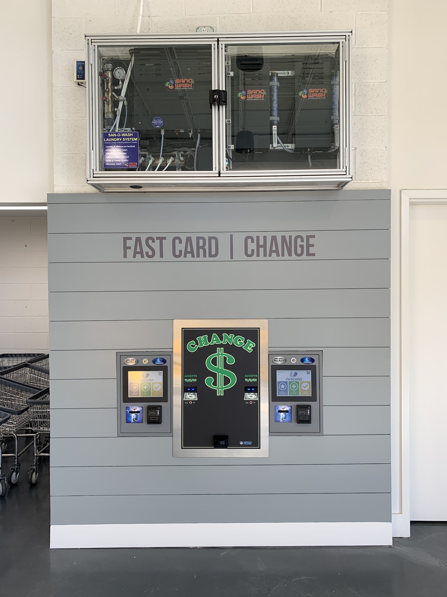 Fascard loading and change machine wall at Oz Laundry