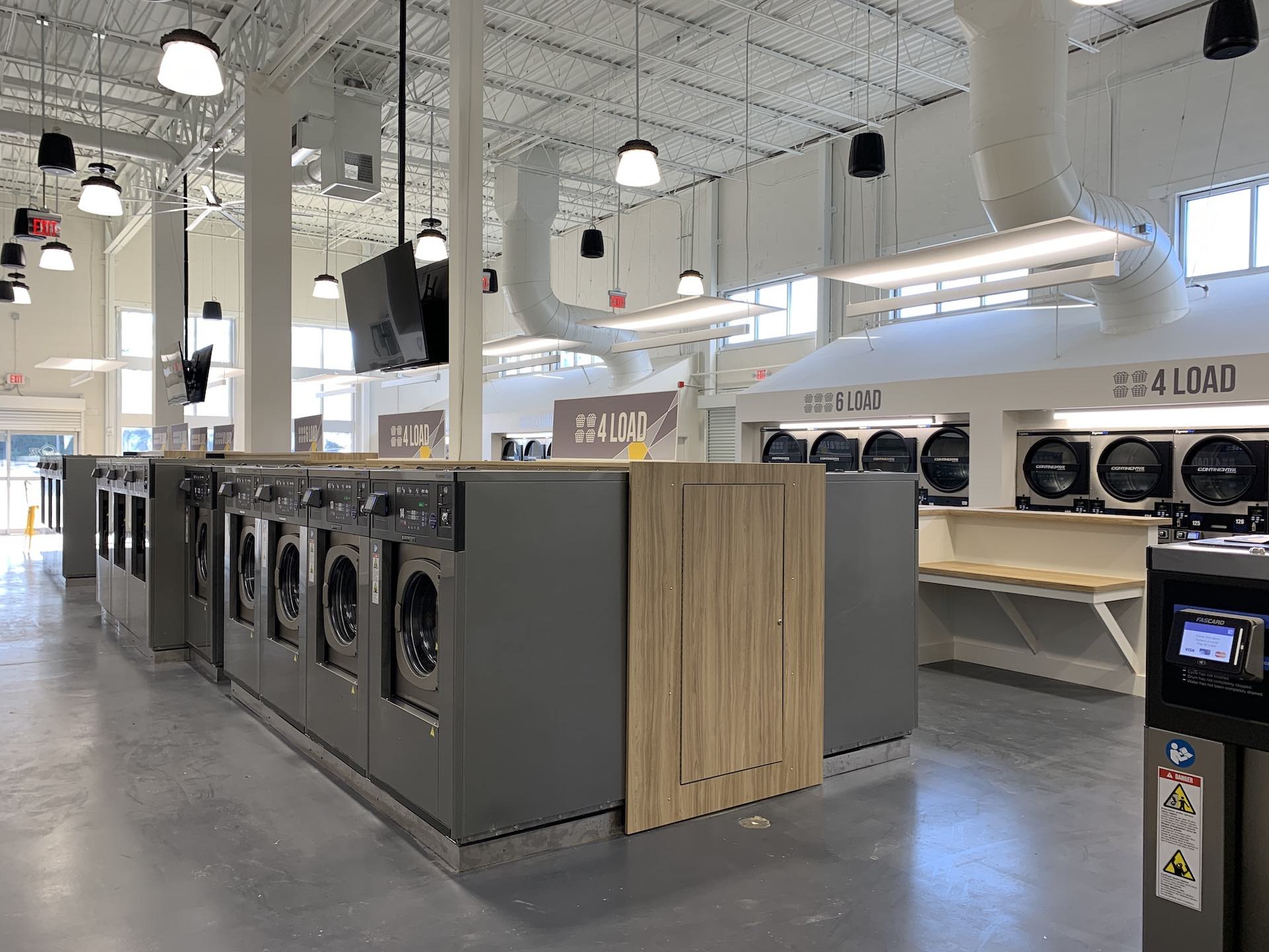 Washers and folding counters at Oz Laundry in Decatur